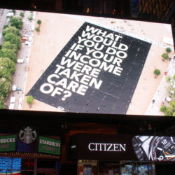 Billboard that says "What would you do if your income were taken care of?"
